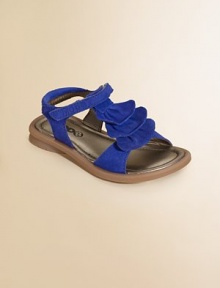 A sweet pair of cozy sandals is given a pretty update with tiers of ruffles.Grip-tape closureLeather upperLeather liningRubber solePadded insoleImported A sweet pair of cozy sandals is given a pretty update with tiers of ruffles.Grip-tape closureLeather upperLeather liningRubber solePadded insoleImported