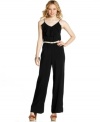 Get high on sleek style in a ruffled jumpsuit that creates a lean, mean silhouette -- and seamlessly transitions from day to night! From BCX.