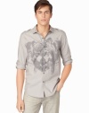 Get our of your boring button-down rut with this cool animal graphic military shirt by Calvin Klein Jeans.