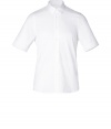 Minimalist and modern, Jil Sanders short sleeve button-down is a characteristic chic take on this essential spring style - Classic collar, short sleeves, button-down front, back shirttail hemline - Slim fit - Wear tucked into tailored trousers with sleek leather lace-ups