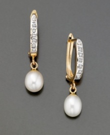 Eternally elegant, these earrings feature cultured freshwater pearls (6 mm) and diamond accents. Set in 14k gold. 1 inch drop. Eternally elegant, these earrings feature cultured freshwater pearls (6 mm) and diamond accents. Set in 14k gold. 1 inch drop.