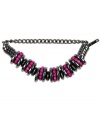 Think pink. Hot hues are the perfect accent to your favorite warm-weather ensemble. Nine West's electric pink beaded design pops against a hematite-plated mixed metal setting. Bracelet stretches to fit wrist. Approximate diameter: 2-1/4 inches.