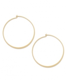 Always elegant. Studio Silver's endless hoop earrings, set in 18k gold over sterling silver, evoke a classic cool perfect for any occasion. Approximate diameter: 1-1/2 inches. Always elegant. Studio Silver's endless hoop earrings, set in 18k gold over sterling silver, evoke a classic cool perfect for any occasion. Approximate diameter: 1-1/2 inches.
