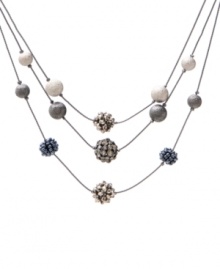 The airy, lightweight look of Kenneth Cole New York's illusion necklace is anchored by an array of stylish beaded spheres. Set in hematite tone mixed metal. Approximate length: 16 inches + 3-inch extender. The airy, lightweight look of Kenneth Cole New York's illusion necklace is anchored by an array of stylish beaded spheres. Set in hematite tone mixed metal. Approximate length: 16 inches + 3-inch extender.