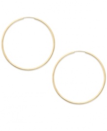 Forever stylish, forever chic. This pair of endless hoop earrings comes in 14k gold. Approximate diameter: 25 mm. Forever stylish, forever chic. This pair of endless hoop earrings comes in 14k gold. Approximate diameter: 25 mm.