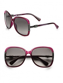 Be glamorous in this resin style in sleek metal accented with glittering Swarovski crystals. Available in shiny transparent violet with smoke gradient lens or shiny dark brown with brown gradient lens. Metal accentsSwarovski crystals100% UV protectionMade in Italy Be glamorous in this resin style in sleek metal accented with glittering Swarovski crystals. Available in shiny transparent violet with smoke gradient lens or shiny dark brown with brown gradient lens. Metal accentsSwarovski crystals100% UV protectionMade in Italy