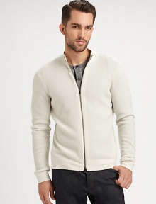 An elegant, contemporary design that layers beautifully over any soft cotton henley or woven sportshirt to keep you stylishly warm and cozy all season long; Knitted in waffle textured cashmere for longlasting style and comfort.Two-way zip frontMockneckBanded cuffs and hemCashmereDry cleanImported