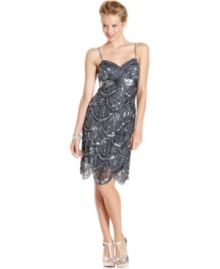 Shine like a star in this sultry spaghetti-strap gown by Jump --shimmery sequins a and scalloped hemline create a marvelous combination!