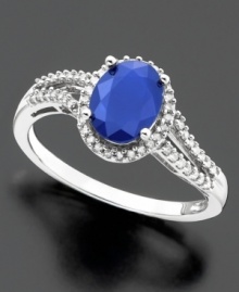 Show off your glam style! An oval-cut sapphire (1-1/2 ct. t.w.) is nestled within the sparkle of round-cut diamonds (1/6 ct. t.w.). Set in 14k white gold. Show off your glam style! An oval-cut sapphire (1-1/2 ct. t.w.) is nestled within the sparkle of round-cut diamonds (1/6 ct. t.w.). Set in 14k white gold.