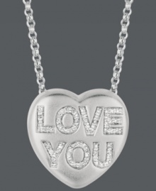 Get in touch with your inner romantic. Give her the gift of Sweethearts' stunning pendant. Crafted in sterling silver, this heart-shaped design features the words LOVE YOU in round-cut diamonds (1/6 ct. t.w.). Copyright © 2011 New England Confectionery Company. Approximate length: 16 inches + 2-inch extender. Approximate drop: 5/8 inch. Get in touch with your inner romantic. Give her the gift of Sweethearts' stunning pendant. Crafted in sterling silver, this heart-shaped design features the words LOVE YOU in round-cut diamonds (1/6 ct. t.w.). Copyright © 2011 New England Confectionery Company. Approximate length: 16 inches + 2-inch extender. Approximate drop: 5/8 inch.