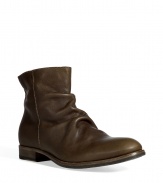 Bring urbane-cool style to your look with these luxe boots from Fiorentini & Baker - Upturned toe, supple leather with front wrinkle detail, chunky heel, exposed side zip closure - Pair with straight leg jeans or slim trousers, a sleek button down, and a blazer