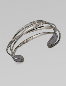 Slender, polished bands, sprinkled with Swarovski crystals, crisscross one another gracefully in this lovely cuff design.CrystalRuthenium platedDiameter, about 2¼Width, about ¾Imported Slender, polished bands, sprinkled with Swarovski crystals, crisscross one another gracefully in this lovely cuff design.CrystalRuthenium platedDiameter, about 2¼Width, about ¾Imported