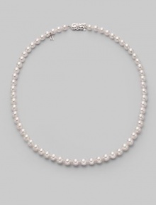 From the Akoya collection. A classic strand of white Akoya pearls with a pretty filigree clasp. 6.5mm white round cultured pearls Quality: A1 18k white gold Length, about 18 Mikimoto signature clasp Imported From the Akoya collection. A classic strand of white Akoya pearls with a pretty filigree clasp. 6.5mm white round cultured pearls Quality: A1 18k white gold Length, about 18 Mikimoto signature clasp Imported
