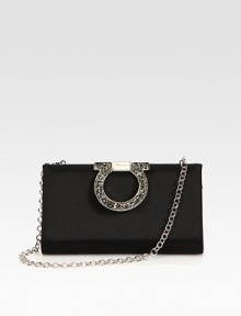 An elegant and versatile design in smooth satin embellished with an oversized, rhinestone accented logo closure.Detachable chain shoulder strap, 9½ dropHinged, fold-over top closureOne inside open pocketQuilted satin lining8W X 4½H X 1½DMade in Italy An elegant and versatile design in smooth satin embellished with an oversized, rhinestone accented logo closure.Detachable chain shoulder strap, 9½ dropHinged, fold-over top closureOne inside open pocketQuilted satin lining8W X 4½H X 1½DMade in Italy