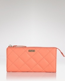 Uptown girls will love kate spade new york's quilted leather wallet. In luxe quilted leather with ample currency space, it's proof practical accessories can exude polish. Uptown girls will love kate spade new york's quilted leather wallet. In luxe quilted leather with ample currency space, it's proof practical accessories can exude polish.