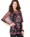 Go bold in a graphic print with this Alfani tunic! It's relaxed shape pairs perfectly over skinny jeans!