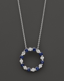 Diamond and sapphire circle pendant in 14K white gold.