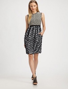 A softly pleated, wonderfully textural skirt crowned by a tailored, graphic bodice.Jewel necklineSleevelessBanded waistBack zipAbout 22 from natural waistBodice: silkSkirt: 71% cotton/18% silk/11% nylonLining: silkDry cleanMade in USA of imported fabric