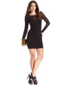 Sheer mesh adds a super sultry appeal to this little black dress by GUESS -- perfect for hot soiree style!