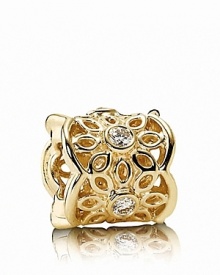 A 14K gold scalloped design featuring white diamond accents adds radiance to your PANDORA bracelet. A 14K gold scalloped design featuring white diamond accents adds radiance to your PANDORA bracelet.