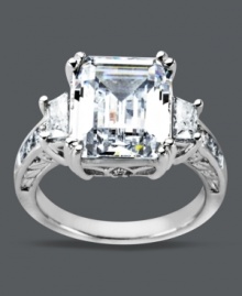 An engagement-style ring at an affordable price! This divine Arabella style highlights a large emerald-cut Swarovski zirconia (12-9/10 ct. t.w.) decorated with sparkling side accents. Crafted in sterling silver. Size 7.