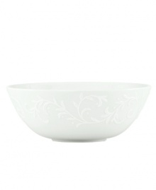 An elegant white-on-white pattern, embossed vine motif and interior glaze adorn this medium serving bowl from Lenox dinnerware. The dishes from the Opal Innocence Carved collection get your table set for refined dining every day. Qualifies for Rebate