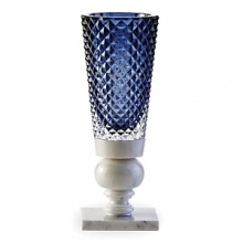 Designed by Marcel Wanders, Baccarat's Kings of the Forest vase was inspired by nature and the Dutch art of lace making. Combining various materials and patterns, it features diamond-cut crystal atop a marble base. Designed by Marcel Wanders, Baccarat's Kings of the Forest vase was inspired by nature and the Dutch art of lace making. Combining various materials and patterns, it features diamond-cut crystal atop a marble base.