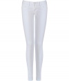 Elevate your casual look with these bright white skinnies from True Religion - Low-rise, classic five-pocket styling, slim fit, skinny leg - Style with an oversized blouse, a boyfriend blazer, and embellished ballet flats