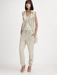 Parka-inspired details dress up this sleeveless zip-front design.Foldover collarAsymmetrical front zipSnap detailsFlap pocketsSide slash pocketsGathered hemlineBack vent with rivet detailsFully linedAbout 32 from shoulder to hem60% viscose/40% polyesterDry cleanImportedModel shown is 5'9 (175cm) wearing US size 4. Parka-inspired details dress up this sleeveless zip-front design.Foldover collarAsymmetrical front zipSnap detailsFlap pocketsSide slash pocketsGathered hemlineBack vent with rivet detailsFully linedAbout 32 from shoulder to hem60% viscose/40% polyesterDry cleanImportedModel shown is 5'9 (175cm) wearing US size 4.