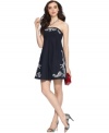 Rendered from 100% cotton, this Tommy Hilfiger dress is a breezy choice for your next special event. The super-chic babydoll silhouette and embroidered accents make it a vintage-inspired winner!