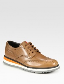 A fresh, modern take on the classic oxford, crafted from Italian calfskin leather with a striped sole.Leather upperLeather liningRubber soleMade in Italy A fresh, modern take on the classic oxford, crafted from Italian calfskin leather with a striped sole.Leather upperLeather liningRubber soleMade in Italy