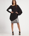 A new angle on a luxurious top, knit of silk and cotton with two different sleeves and a dramatic diagonal hem.Off-center V neckline with exposed seamOne long slim sleeve, one long draped batwing sleeveAngular hemAbout 24¾ from shoulder to hem55% silk/45% cottonDry cleanImported Model shown is 5'9½ (176cm) wearing US size 4. 