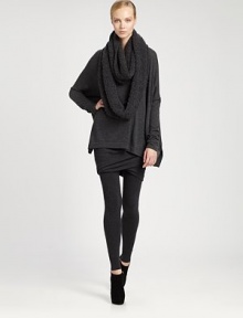 Luxurious cashmere blended with a touch of stretch in an easy-fit poncho style.Slightly oversizedRoundneckDropped shouldersLong sleevesAsymmetric hem78% cashmere/19% nylon/3% elastaneDry cleanImported of Italian fabricModel shown is 5'11 (180cm) wearing US size Small.