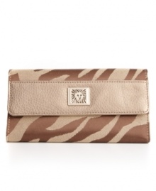 A stylish everyday wallet is essential for the modern girl-on-the-go. With a fashionable animal print exterior and ultra organized interior design, this wallet will take you anywhere in style. A stylish everyday wallet is essential for the modern girl-on-the-go. With a fashionable animal print exterior and ultra organized interior design, this wallet will take you anywhere in style.
