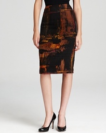 Bold strokes of color embolden a Lafayette 148 New York skirt, outfitted with faux leather piping for feminine edge. Bold strokes of color embolden a Lafayette 148 New York skirt, outfitted with faux leather piping for feminine edge.