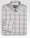 A fitted, tailored silhouette modernizes this check patterned, cotton dress shirt.Button-frontPoint collarCottonMachine washMade in Italy