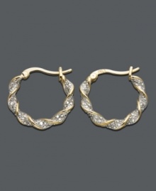 Simple hoops with a sparkling twist. Earrings by Victoria Townsend are crafted in 18k gold over sterling silver with round-cut diamond accents and a unique twisted design. Approximate diameter: 3/4 inch. Simple hoops with a sparkling twist. Earrings by Victoria Townsend are crafted in 18k gold over sterling silver with round-cut diamond accents and a unique twisted design. Approximate diameter: 3/4 inch.