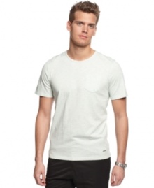 It's time to tee up this summer. Enhance your casual cool with this heathered shirt from Calvin Klein.