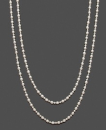 Polish and shine for miles! This long, cultured freshwater pearl (5-6 mm and 7-8 mm) strand necklace provides an elegant, layered look that's both timeless and unique. Approximate length: 64 inches. Polish and shine for miles! This long, cultured freshwater pearl (5-6 mm and 7-8 mm) strand necklace provides an elegant, layered look that's both timeless and unique. Approximate length: 64 inches.