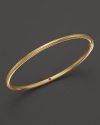 Stunningly simple, Roberto Coin's 18K gold satin bangle makes a subtle statement in a satin finish.