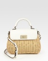 Spring into a new season with this impeccable shape crafted of beautifully-woven wicker with leather trim. Top handle, 4 dropAdjustable shoulder strap, 18½-21½ dropTurnlock flap closureProtective metal feetOne inside zip pocketTwo inside open pocketsCotton lining9¾W X 9¾H X 3¾DImported