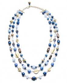 An instant splash of style. Lauren by Ralph Lauren's pretty three-row necklace incorporates blue-hued rosary beads made of glass. Set in mixed metal with a lobster claw clasp. Approximate lengths: 18 inches, 19-1/2 inches and 21 inches.