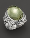 Sterling silver, detailed with a mythological motif, houses a dramatic, faceted prasiolite.