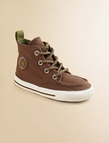 A classic high-top, lace-up design with Chuck Taylor insole and rubber sole, crafted in sturdy canvas.Lace-upCanvas upperTextile liningRubber soleTraditional chuck insoleImported A classic high-top, lace-up design with Chuck Taylor insole and rubber sole, crafted in sturdy canvas.Lace-upCanvas upperTextile liningRubber soleTraditional chuck insoleImported