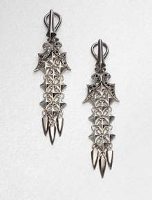 From the Superstud Collection. Spikes and studs, daggers and black sapphires all come together in this dramatic drop design of sterling silver finished with black and white rhodium plating for a striking two-tone effect.Black sapphireWhite and black rhodium-plated sterling silverLength, about 2.25Post-and-hinge back with 14k yellow gold postImported From the Superstud Collection. Spikes and studs, daggers and black sapphires all come together in this dramatic drop design of sterling silver finished with black and white rhodium plating for a striking two-tone effect.Black sapphireWhite and black rhodium-plated sterling silverLength, about 2.25Post-and-hinge back with 14k yellow gold postImported