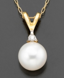 Queen of the gems. Belle de Mer's stunning necklace features a cultured freshwater pearl (6-1/2-7 mm) and round-cut diamond accents set in 14k gold. Approximate length: 18 inches. Approximate drop: 1/2 inch. Queen of the gems. Belle de Mer's stunning necklace features a cultured freshwater pearl (6-1/2-7 mm) and round-cut diamond accents set in 14k gold. Approximate length: 18 inches. Approximate drop: 1/2 inch.