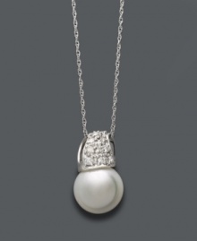 Give the gift of timeless beauty. This classic pendant by Belle de Mer defines elegance with a cultured freshwater pearl (9-10 mm) and sparkling, round-cut diamonds (1/6 ct. t.w.) in a 14k white gold wave setting. Approximate length: 18 inches. Approximate drop: 1/2 inch. Give the gift of timeless beauty. This classic pendant by Belle de Mer defines elegance with a cultured freshwater pearl (9-10 mm) and sparkling, round-cut diamonds (1/6 ct. t.w.) in a 14k white gold wave setting. Approximate length: 18 inches. Approximate drop: 1/2 inch.