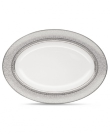 Lavishly detailed with shimmering platinum scrolls and scalloping, the Odessa Platinum bone china oval serving platter is a grand example of formal serveware. Coordinates with a full range of accessories and formal place settings. By Noritake. Lavishly detailed with shimmering platinum scrolls and scalloping, the Odessa Platinum bone china oval serving platter is a grand example of formal serveware. Coordinates with a full range of accessories and formal place settings. By Noritake.