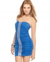 Own the night in this ruched minidress from XOXO that sports a hot, curving-hugging silhouette!