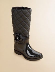 Chase away her rainy day blues in these quilted rubber rainboots with plastic flower and stone decoration.Pull-on styleQuilted nylon and fabric upperFaux leather liningRubber solePadded insoleImported Chase away her rainy day blues in these quilted rubber rainboots with plastic flower and stone decoration.Pull-on styleQuilted nylon and fabric upperFaux leather liningRubber solePadded insoleImported